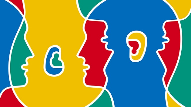 Imagen cartel que contiene European Day Languages con dos caras de colores: verde, rojo, amarillo y azul.